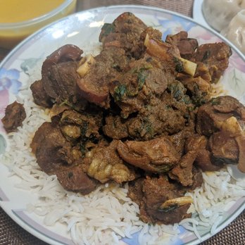 Tashi Delek Cuisine - Goat curry w/jasmine rice (take-out plating) - Indian Near Me - El Cerrito, California