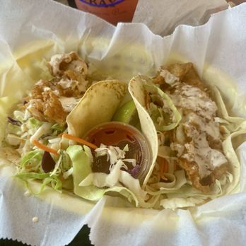 McConkey's Jungle Shack - "Fish Tacos" (beer battered, fried flounder filets in warm flour tortillas with shredded cabbage and McConkey's sauce, salsa, lime wedge) - Burgers Near Me - Edisto Beach, South Carolina McConkey's Jungle Shack - "Fish Tacos" (beer battered, fried flounder filets in warm flour tortillas with shredded cabbage and McConkey's sauce, salsa, lime wedge) - Burgers Near Me - Edisto Beach, South Carolina
