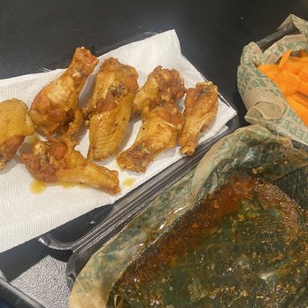 Wingstop - Literally had to drain my wings on a napkin. And as you can see, there are a mix of drums and flats even though I paid EXTRA for all drums! - Chicken Wings Near Me - Wildomar, California