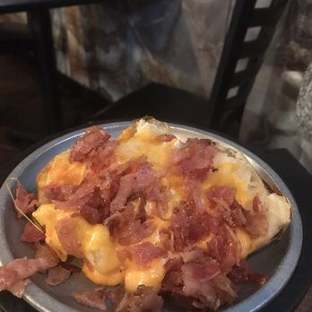 Capers - 1/2 of the huge baked potato - Steakhouses Near Me - Detroit, Michigan