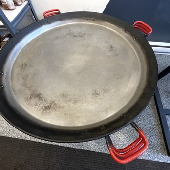 Montréal Paella - an empty pan on a stand - Spanish Near Me - Montreal, Quebec Montréal Paella - an empty pan on a stand - Spanish Near Me - Montreal, Quebec