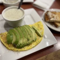 Duluth Diner - Avocado omelet with grits