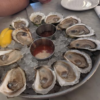 Neptune Oyster - 4 different varieties of oysters with 3 of each kind. Minionette, and cocktail sauce - Seafood Near Me - Boston, Massachusetts
