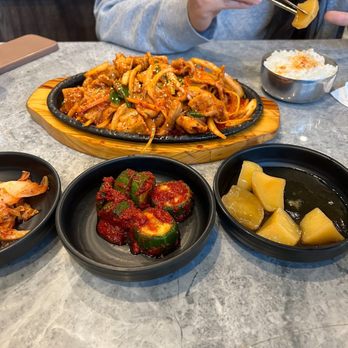 Ozen Korea - Spicy pork on hot plate, side dishes - Korean Near Me - London, Ontario Ozen Korea - Spicy pork on hot plate, side dishes - Korean Near Me - London, Ontario