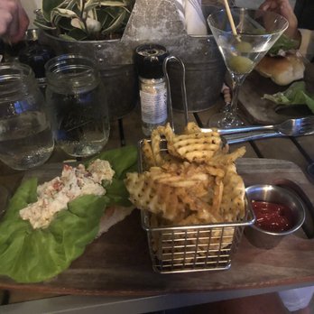 Saltwater - Lobster roll and fries.. you might be wondering where the roll is.. hint.. look under the lettuce.. fries look good.. but cold and hard - Seafood Near Me - Newport, Rhode Island Saltwater - Lobster roll and fries.. you might be wondering where the roll is.. hint.. look under the lettuce.. fries look good.. but cold and hard - Seafood Near Me - Newport, Rhode Island