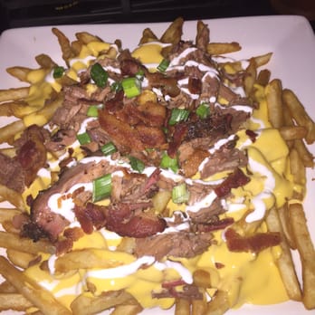 The  5th  Quarter - Fifth Quarter fries! The pulled pork on top is melt in your mouth tender and so flavorful! - American Near Me - Visalia, California
