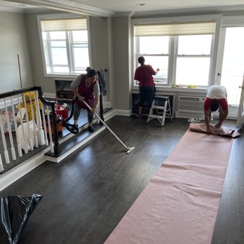 SHAPEUP Contracting - a man and a woman cleaning a room - General Contractors Near Me SHAPEUP Contracting - a man and a woman cleaning a room - General Contractors Near Me