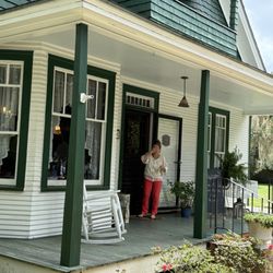 Miss Luci's Tea Room & More - Ms. Luci - waving goodbye.