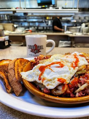 Photo of Silver Grill Cafe - Fort Collins, CO, US. Beer Braised Corned Beef Hash & Eggs