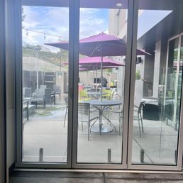 Outside pool area. Good amount of seating and 2 BBQ Outside pool area. Good amount of seating and 2 BBQ