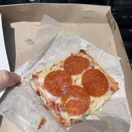 What was left of my 3 slices of extra pepperoni, extra cheese pizza before I realized I should take a picture