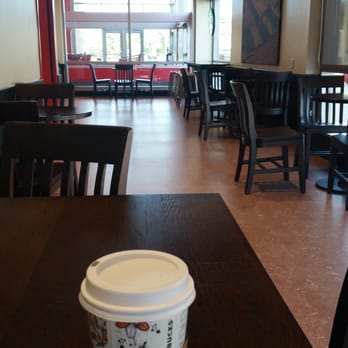 Starbucks - Starbucks in Target seating area - 6 tables with 3 chairs each, 5 high table bar stools, 2 child seats - Coffee & Tea Near Me - Lake Bluff, Illinois