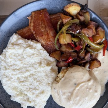 Binninger-Schwartz - Breakfast plate with grits subbed instead of eggs - New American Near Me - Manchester, Tennessee