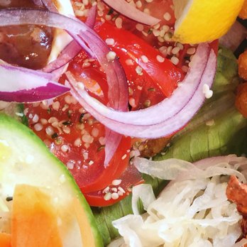 Beach Veggie - TOPPINGS: Sauerkraut, carrot, tomato, cucumber, live pea sprouts, red onion, tahini sauce, hemp seed, a soaked organic apricot. - Vegan Near Me - Wasaga Beach, Ontario