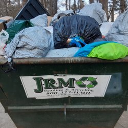 Jrm Hauling & Recycling - Overloaded, broken dumpster