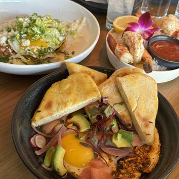 Cala - Shrimp cocktail (top right), Huevos Rancheros (top left), and Cala Turkish Eggs (bottom center). - Mediterranean Near Me - Scottsdale, Arizona Cala - Shrimp cocktail (top right), Huevos Rancheros (top left), and Cala Turkish Eggs (bottom center). - Mediterranean Near Me - Scottsdale, Arizona