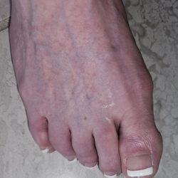 The Polished Nails & Day Spa - Thick line and $25 extra. Not the best pedicure.