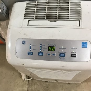 Extra Space Storage - The small dehumidifier in the storage, it reads 90 degrees! - Self Storage Near Me - Kensington, Maryland