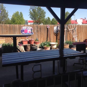 Village Pub - outdoor seating area with tables and chairs - Bars Near Me - Boise, Idaho Village Pub - outdoor seating area with tables and chairs - Bars Near Me - Boise, Idaho