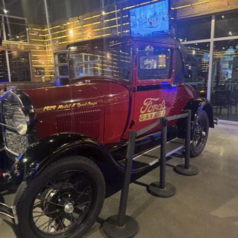 Ford's Garage Pier Park - Show car inside the restaurant - Comfort Food Near Me - Panama City Beach, Florida Ford's Garage Pier Park - Show car inside the restaurant - Comfort Food Near Me - Panama City Beach, Florida