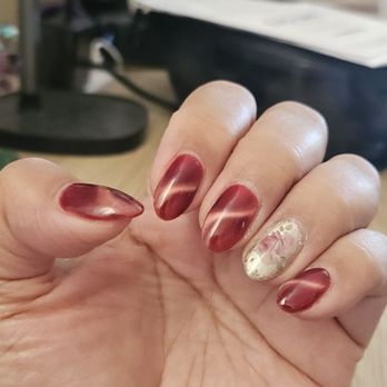 Belle Nails and Spa - Cats eye with flower sticker on ring finger. - Nail Salons Near Me - Concord, California