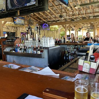 Half Wall - a man sitting at a bar - American Near Me - New Smyrna Beach, Florida