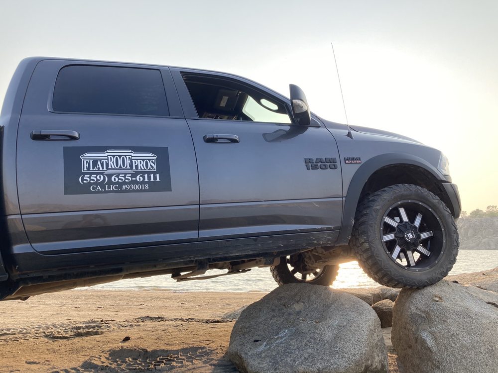 Slide of Flat Roof Pros