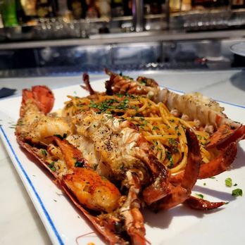 Lago - WHOLE LOBSTER 75 roasted garlic sun dried tomato spaghetti | drawn butter - Italian Near Me - Las Vegas, Nevada