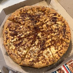 Domino's Pizza - Pizza was burnt, didn't have the buffalo sauce. Took it back, They said that there is nothing wrong with our pizza. Manager was rude
