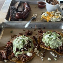 Brisket Tostadas, Sausage (1/3 LB LINK), St Louis Style Pork Ribs, brisket beans Brisket Tostadas, Sausage (1/3 LB LINK), St Louis Style Pork Ribs, brisket beans