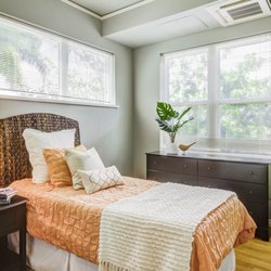 The Plaza at Mililani - Private resident apartment bedroom at The Plaza at Mililani assisted living and senior living community.