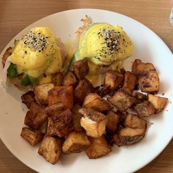 Megg's Cafe - Avo egg Benedict with side of potatoes. The potatoes were a bit overcook for my personal preference. - Bakeries Near Me - Temple, Texas