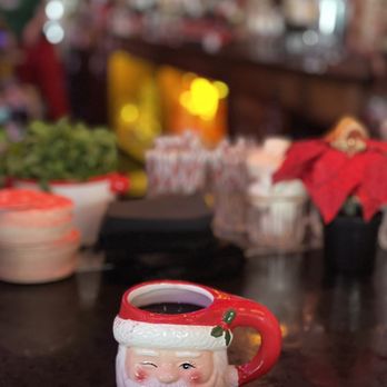 Nickel City - a santa mug on a bar - Bars Near Me - Fort Worth, Texas