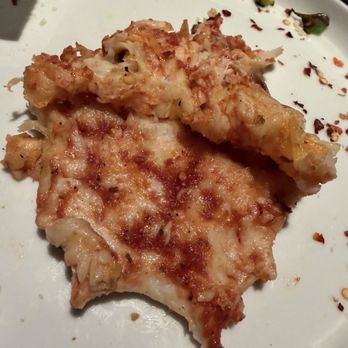 Round Table Pizza - A Pealed-back horrible mass of white cheese-type product revealing the flavorless smattering  of some kind of tomato-based sauce - Pizza Near Me - Concord, California