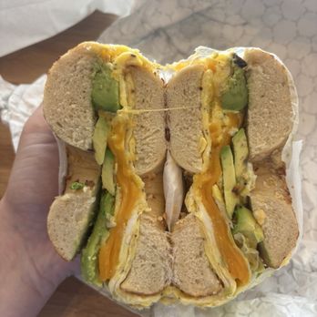 H&H Bagels - Avocado, Egg & Cheese (sub cheddar) on Onion Bagel - Coffee & Tea Near Me - Tampa, Florida H&H Bagels - Avocado, Egg & Cheese (sub cheddar) on Onion Bagel - Coffee & Tea Near Me - Tampa, Florida