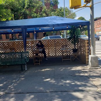 Athena Mediterranean Cuisine - Outdoor dining on the street as well as on the sidewalk (where I'm sitting taking this pic) right next to the restaurant - Mediterranean Near Me - Brooklyn, New York