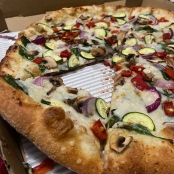 Pizza USA - Half eaten pizza - Pizza Near Me - Bellflower, California Pizza USA - Half eaten pizza - Pizza Near Me - Bellflower, California