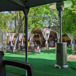 Diddy's - Diddy's out back! Great band, food ,& service. Very laid back vibe. Love it.