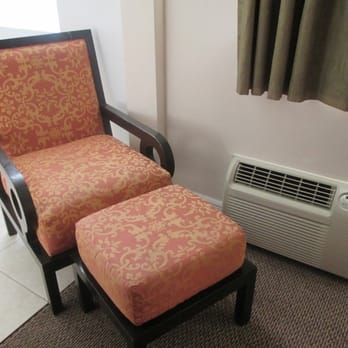 Beach Place Hotel - reclining chair & stool in our room - Hotels Near Me - Miami Beach, Florida Beach Place Hotel - reclining chair & stool in our room - Hotels Near Me - Miami Beach, Florida