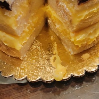 Poul's Bakery - look at all these layers! Cake (light and fluffy) and custard (rich) - Bakeries Near Me - Costa Mesa, California Poul's Bakery - look at all these layers! Cake (light and fluffy) and custard (rich) - Bakeries Near Me - Costa Mesa, California