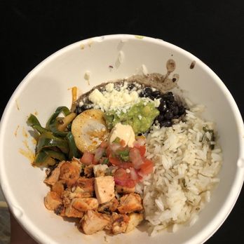 Tocaya Modern Mexican - a person holding a bowl of food - Mexican Near Me - Burbank, California Tocaya Modern Mexican - a person holding a bowl of food - Mexican Near Me - Burbank, California