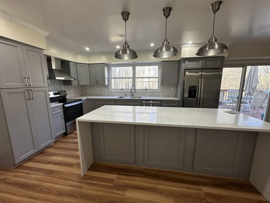 Mina Home Improvement Logo