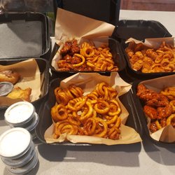 It's just wings - Boneless chicken wings with curly fries and deep fried oreos