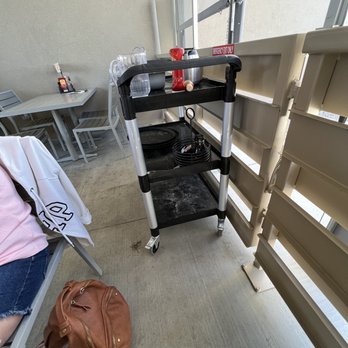 Broken Yolk Cafe - Corner patio next to bus cart - Breakfast & Brunch Near Me - Henderson, Nevada