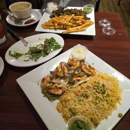 Shrimp kabob with yellow rice; beef and lamb shawarma with fries Shrimp kabob with yellow rice; beef and lamb shawarma with fries