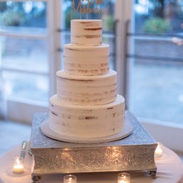 a wedding cake with candles a wedding cake with candles