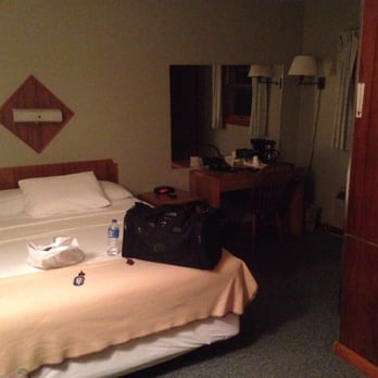 Motel Wilton - A shot from the door, small but really cozy.  It's honestly a similar setup to what you'd find at a brand name motel/hotel. - Hotels Near Me - Wilton, Iowa
