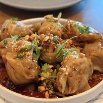 Earls Kitchen + Bar - Chili oil won ton - Cocktail Bars Near Me - Honolulu, Hawaii Earls Kitchen + Bar - Chili oil won ton - Cocktail Bars Near Me - Honolulu, Hawaii