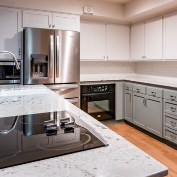 Imagine Remodeling - a modern kitchen with stainless steel appliances - General Contractors Near Me - Fresno, California Imagine Remodeling - a modern kitchen with stainless steel appliances - General Contractors Near Me - Fresno, California
