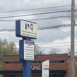 Norton Immediate Care Center - Okolona - Street sign on Preston